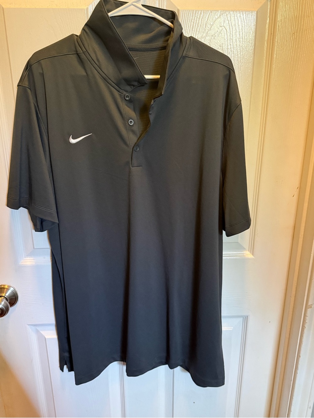 Nike Men's Black Short-Sleeve Polo with White Swoosh